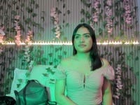 I am a subtle mixture between sweetness and desire. My voice has the softness of a whisper that wraps you, and my laugh, that naughty touch that awakens curiosity. I like to cause delicacy, with looks that say more than they call, and gestures that suggest without hurry.